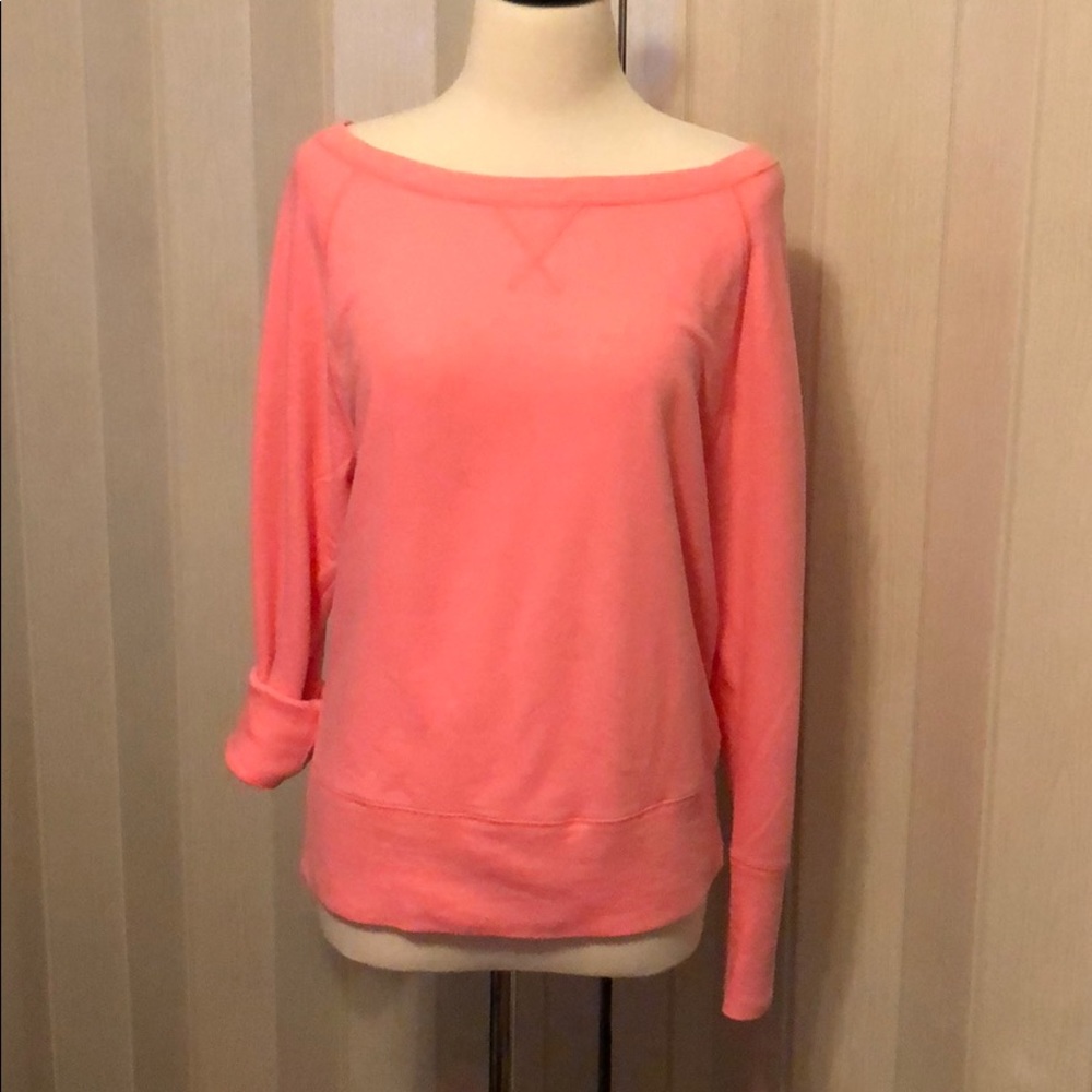 pink sweater made in Cambodia
